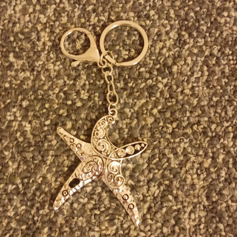 Starfish silver tone keychain with bling
